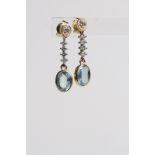 18ct Aquamarine and diamond long drop earrings, in 18ct yellow and white gold