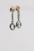 18ct Aquamarine and diamond long drop earrings, in 18ct yellow and white gold