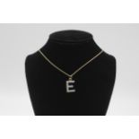 9ct gold vintage clear gemstone set "E" initial letter pendant necklace (2.7g)