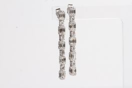 18ct long drop earrings of baguettes and brilliant cut diamonds TDW 1.80ct 4.6g