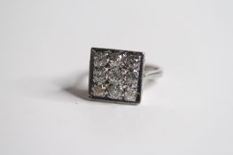 18ct square flat ring with 9 diamonds. Est diamonds 1ct