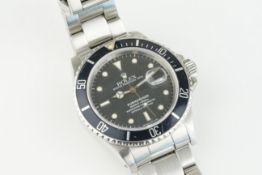 ROLEX OYSTER PERPETUAL SUBMARINER DATE 'TRIPLE ZERO' WRISTWATCH REF. 168000 CIRCA 1987, circular