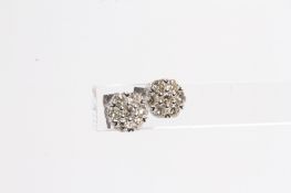 WG 7 stone cluster earrings claw set TDW 0.71ct HM