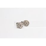 WG 7 stone cluster earrings claw set TDW 0.71ct HM