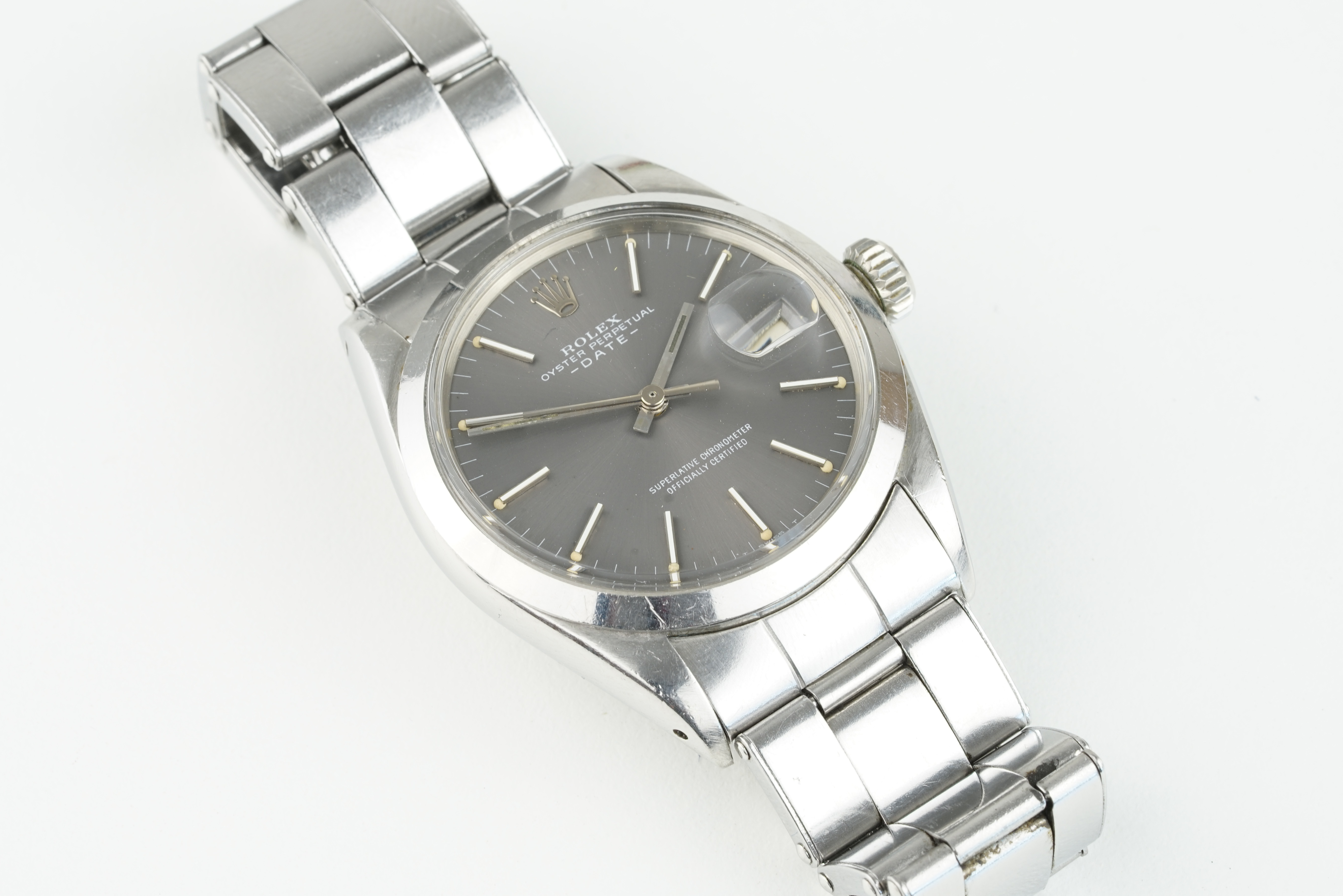 ROLEX OYSTER PERPETUAL DATE WRISTWATCH REF. 1500 CIRCA 1969, circular grey dial with hour markers