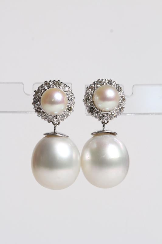 Pearl and diamond clusters with pearl drops below. Tested 18ct. D Est 1.30ct, Pearls set 13.5mm