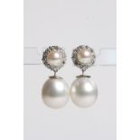 Pearl and diamond clusters with pearl drops below. Tested 18ct. D Est 1.30ct, Pearls set 13.5mm