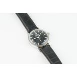 MID SIZE ROAMER POPULAR WRISTWATCH, circular black dial with hour markers and hands, 30mm