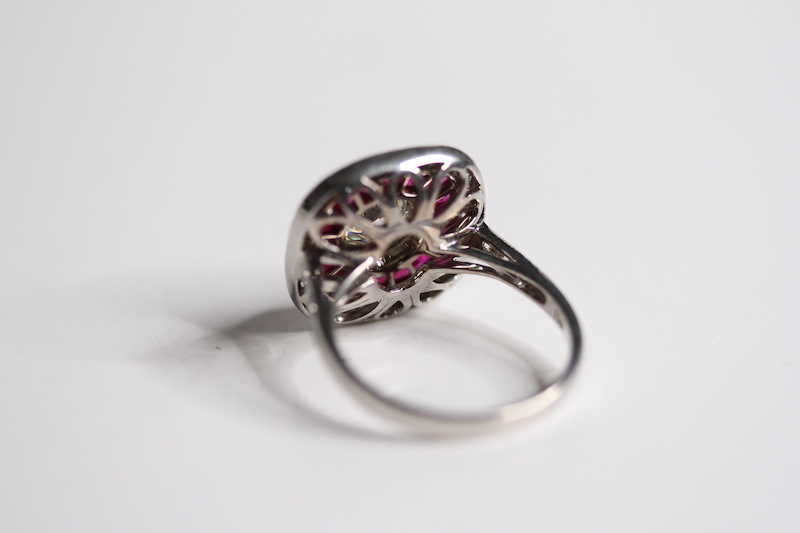 Calibre set RUBY and diamond ring. Central brilliant cut in a rub over setting surrounded by - Image 2 of 3
