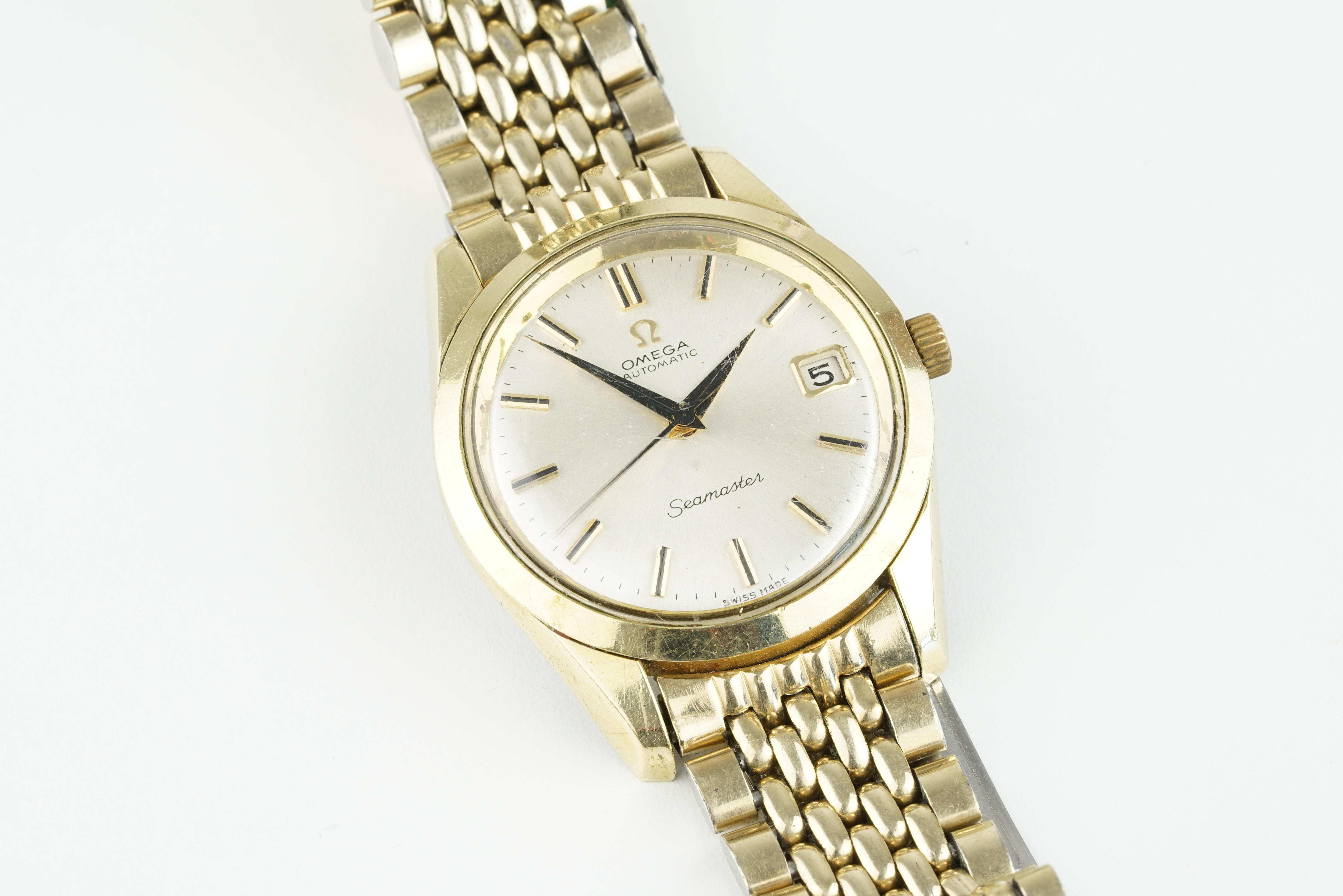 OMEGA AUTOMATIC SEAMASTER DATE GOLD PLATED WRISTWATCH, circular silver dial with baton hour