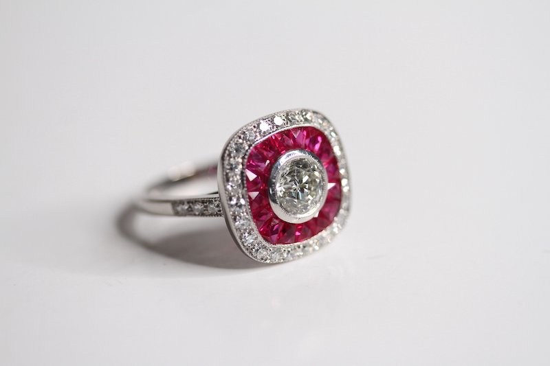 Calibre set RUBY and diamond ring. Central brilliant cut in a rub over setting surrounded by - Image 3 of 3