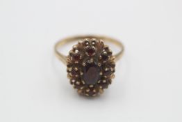 9ct gold vintage garnet halo dress ring (3.7g)