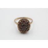 9ct gold vintage garnet halo dress ring (3.7g)