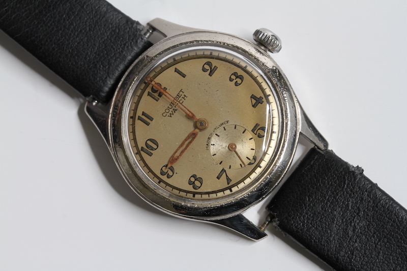 *TO BE SOLD WITHOUT RESERVE* VINTAGE COURBET, two tone dial, Arabic numerals, sub seconds, manual