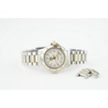 LADIES TAG HEUER PROFESSIONAL WRISTWATCH, circular white dial with applied hour markers and hands,
