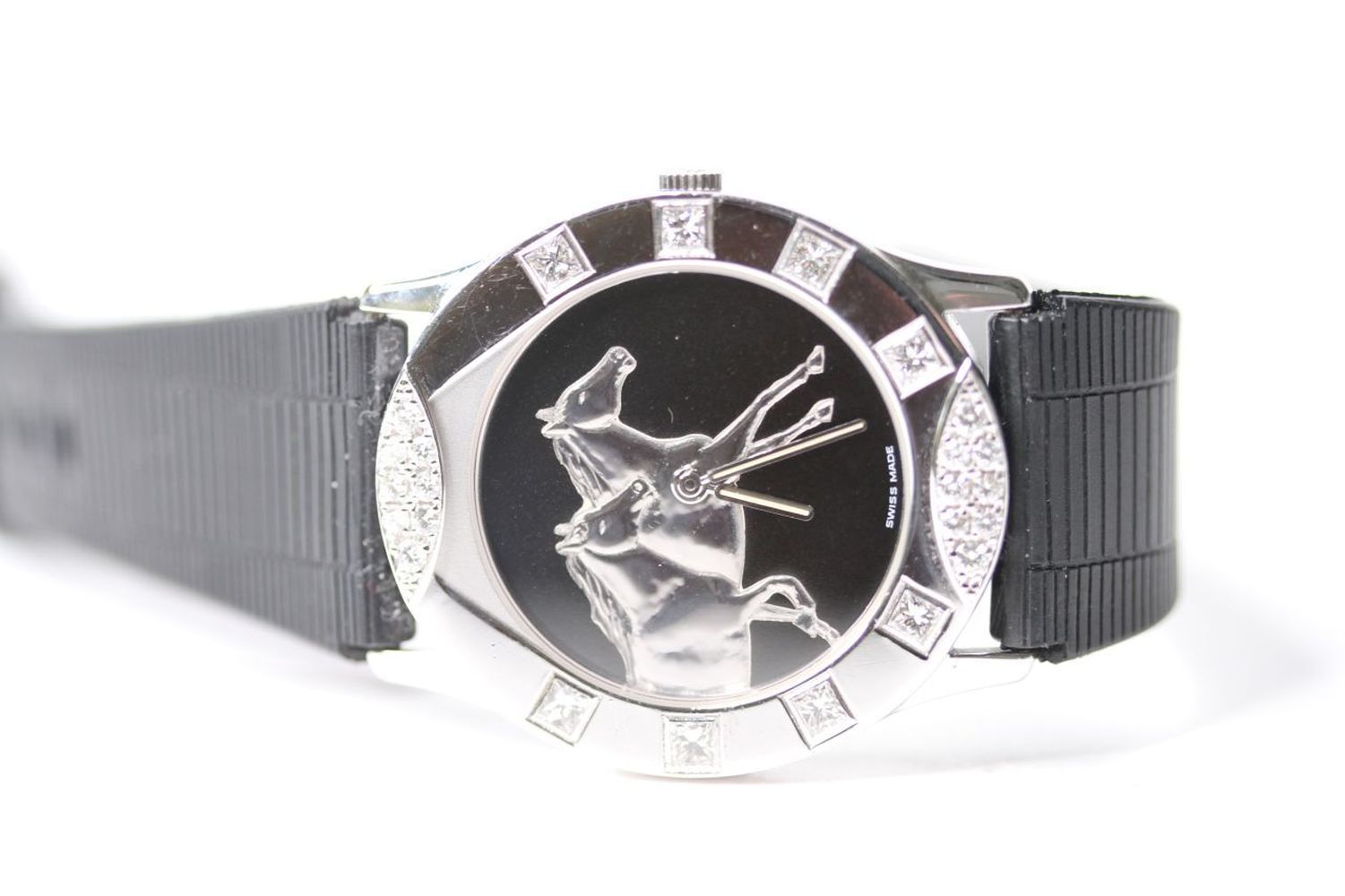 18CT CORUM FOR ASPREY DIAMOND BEZEL WRIST WATCH, black circular dial with two galloping horses,