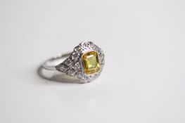 Platinum Yellow Sapphire Ring, octagonal cut yellow sapphire bezel set into a surround of 18