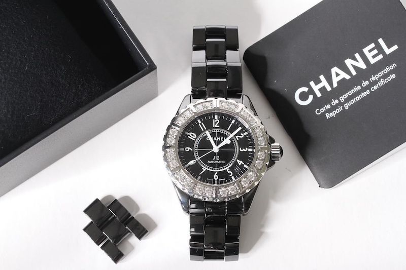 RARE CHANEL J12 CERMAIC DIAMOND BEZEL WITH BOX AND SERVICE PAPERS, circular gloss black dial with