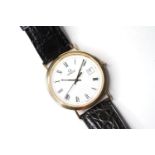18CT OMEGA QUARTZ WRIST WATCH, circular white dial with roman numeral hour markers, date function at