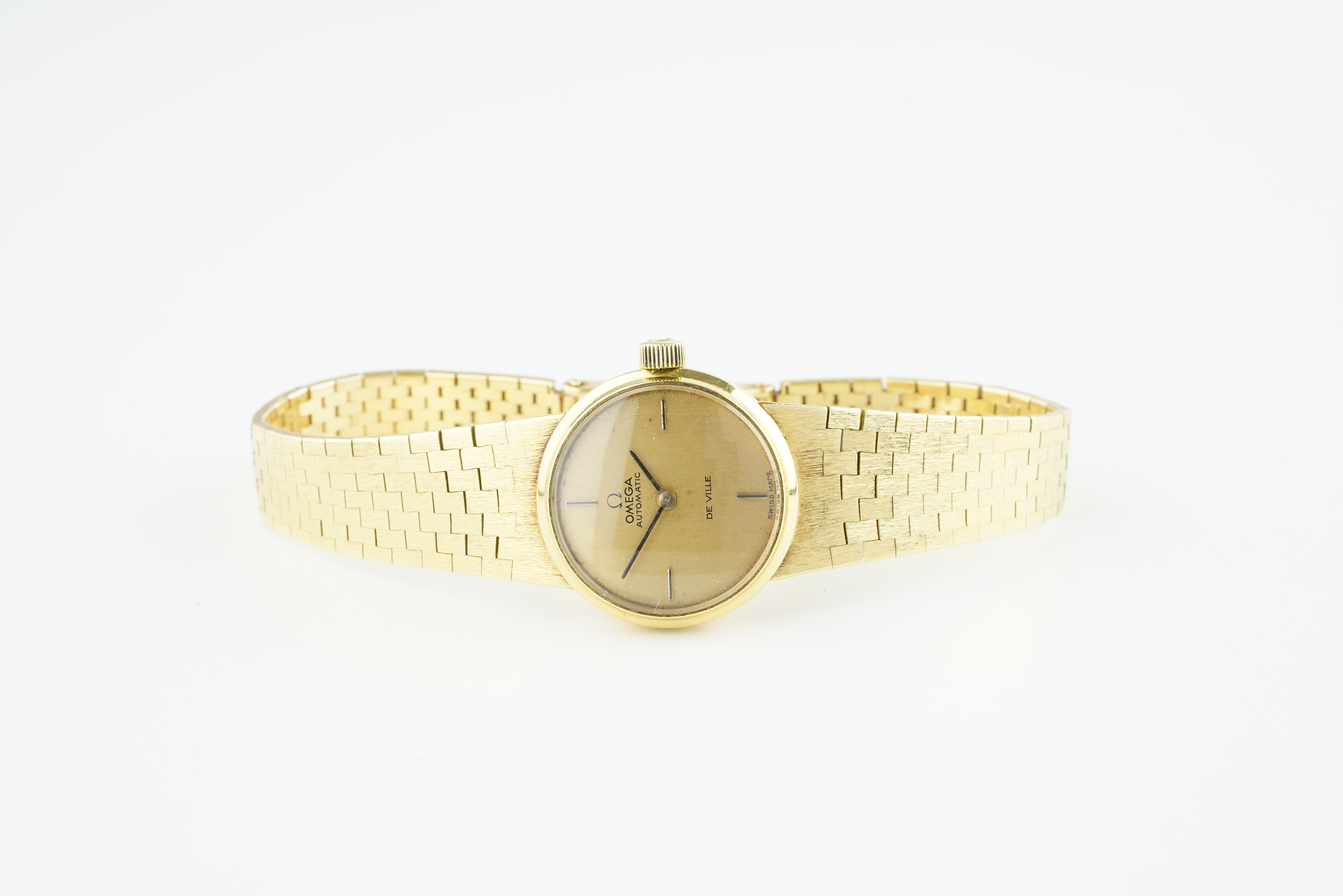 LADIES OMEGA DE VILLE 18CT GOLD WRISTWATCH, circular gold dial with hour markers and hands, 22mm