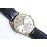 VINTAGE MUDU AUTOMATIC, gilt dial, baton and Arabic numerals, gold plated case, screw down case