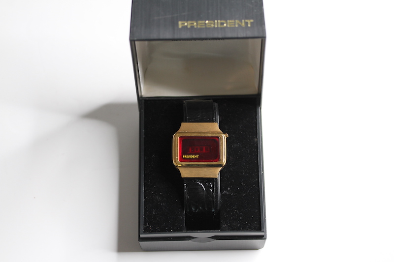 * TO BE SOLD WITHOUT RESERVE* PRESIDENT DIGITAL TIME COMPUTER WITH BOX,red display, gold plated