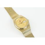 RADO VOYAGER DAY DATE WRISTWATCH, circular gold dial with hour markers and hands, day date window at