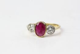 18YG Bezel set ruby and diamond 3 stone ring. Diamonds in wG bezels R 1.04b D 0.70