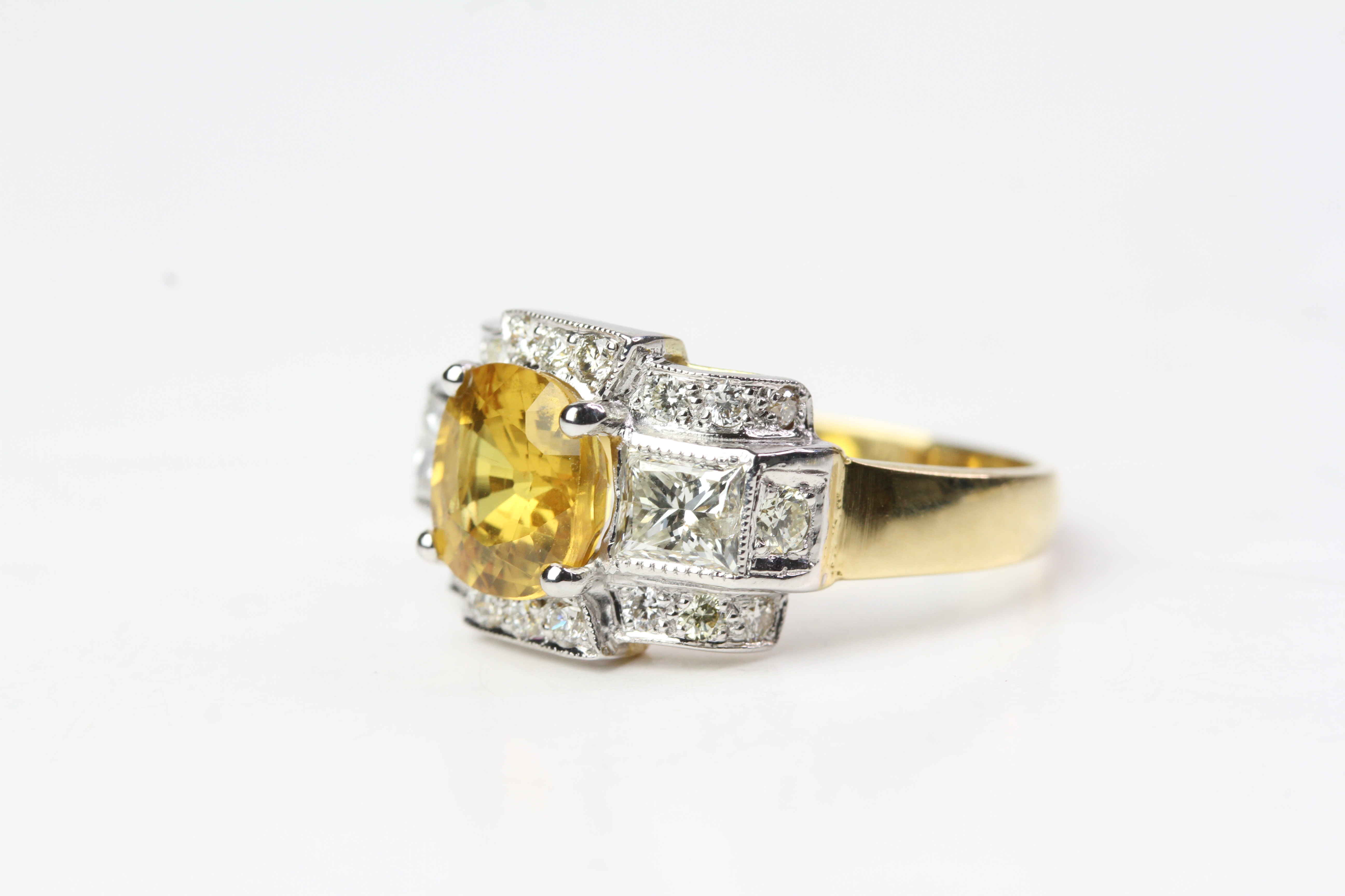 Yellow sapphire and diamond ring. Central yellow sapphire with 2 x princess cuts to each side in a - Image 2 of 2