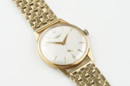 LONGINES 9CT GOLD WRISTWATCH, circular silver dial with hour markers and hands, 34mm 9ct gold case