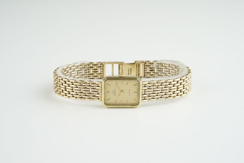 LADIES MARVIN DIAMOND 9CT GOLD COCKTAIL WATCH, rectangular two tone dial with stick hour markers and