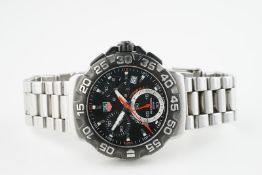 GENTLEMENS TAG HEUER FORMULA 1 CHRONOGRAPH WRISTWATCH, circular black triple register dial with hour