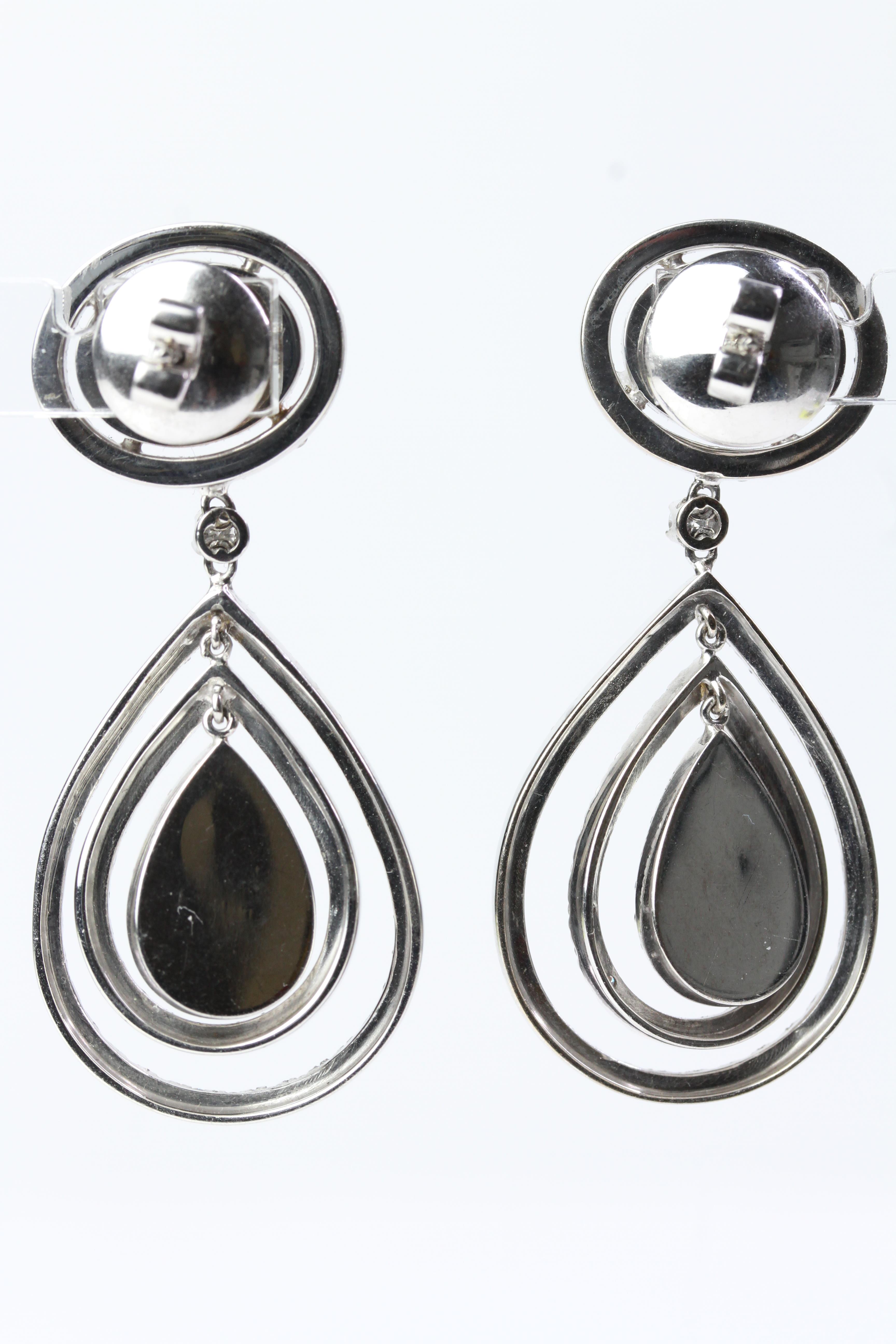 18WG Large pave set pear shaped domes with double moveable halos suspended from an oval pave set - Image 2 of 2