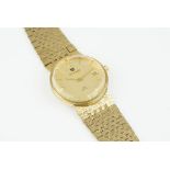 NIVADA C1 DISCUS DATE GOLD PLATED WRISTWATCH, circular gold dial with hour markers and hands, date
