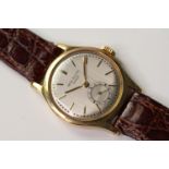 1950s PATEK PHILIPPE CALATRAVA 18CT REFERENCE 2451, circular silver dial with baton hour markers,