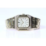 LADIES 18CT AUDEMARS PIGUET DIAMOND SET QUARTZ, rectangular waffle dial, 25mm 18ct gold case with