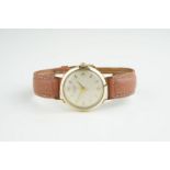 GENTLEMENS J.W. BENSON 9CT GOLD WRISTWATCH, circular off white dial with gold hour markers and