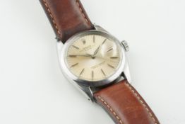 ROLEX OYSTER PERPETUAL DATE WRISTWATCH REF. 1500, circular patina dial with hour markers and