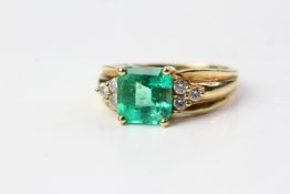 18YG Emerald and diamond ring, Square step cut emerald with 3 brilliant cut diamonds each side. (