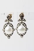 Silverset Freshwater pearl and diamond earrings D0.80