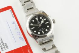 TUDOR BLACK BAY WRISTWATCH W/ GUARANTEE CARD REF. 79580, circular black dial with hour markers and