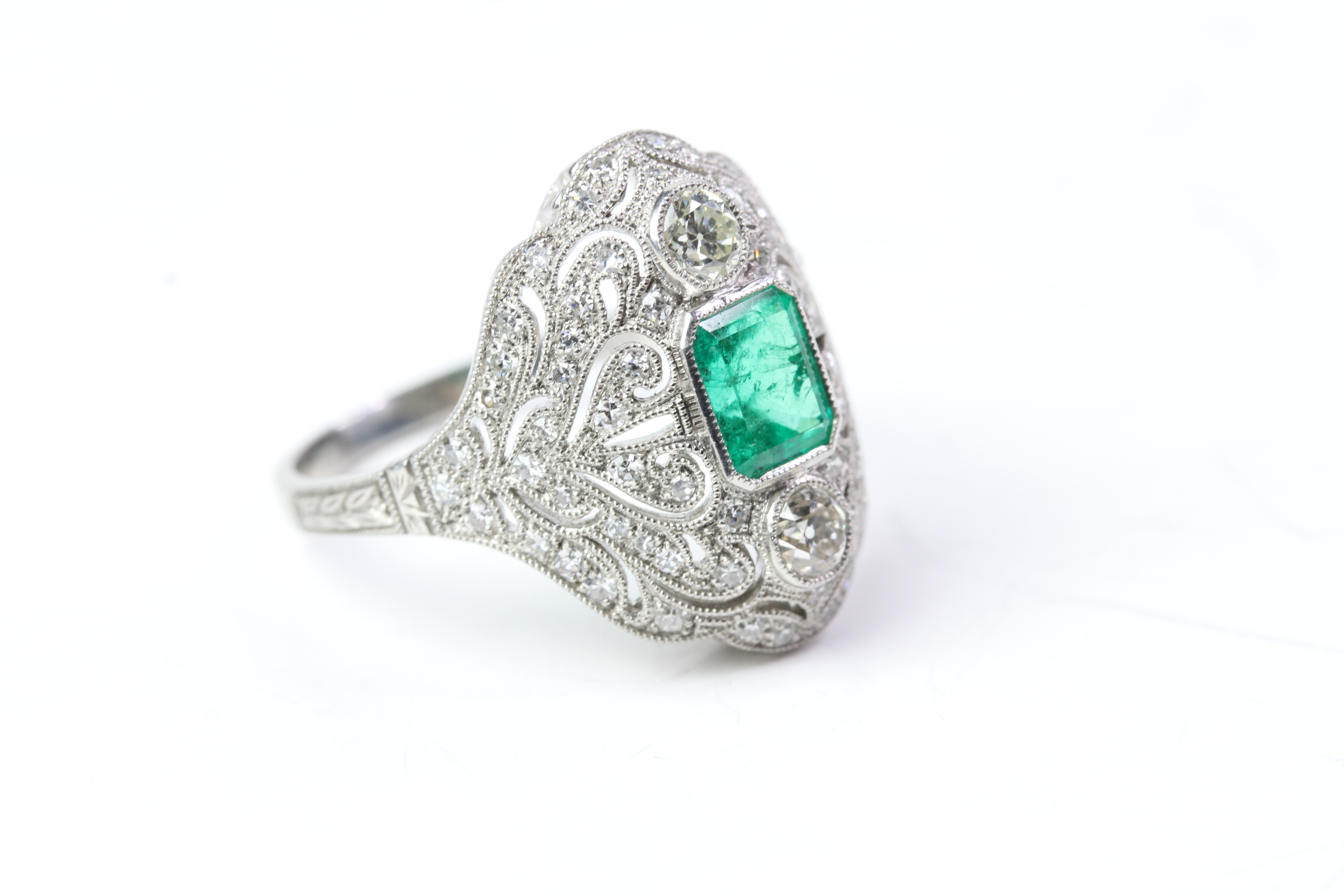 Platinum dress ring columbian emerald and diamond - bombe style with raised emerald between 2 - Image 2 of 3