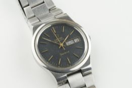 OMEGA GENEVE AUTOMATIC DAY DATE WRISTWATCH, circular black dial with hour markers and hands, 36mm