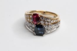 Marked 750 Ruby and sapphire ring with diamond shoulders Thai ruby with heat, Basaltic sapphire with