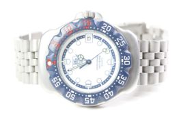 VINTAGE TAG HEUER PROFESSIONAL 200 REFERENCE WA1219, white dial with blue track, blue outer bezel,
