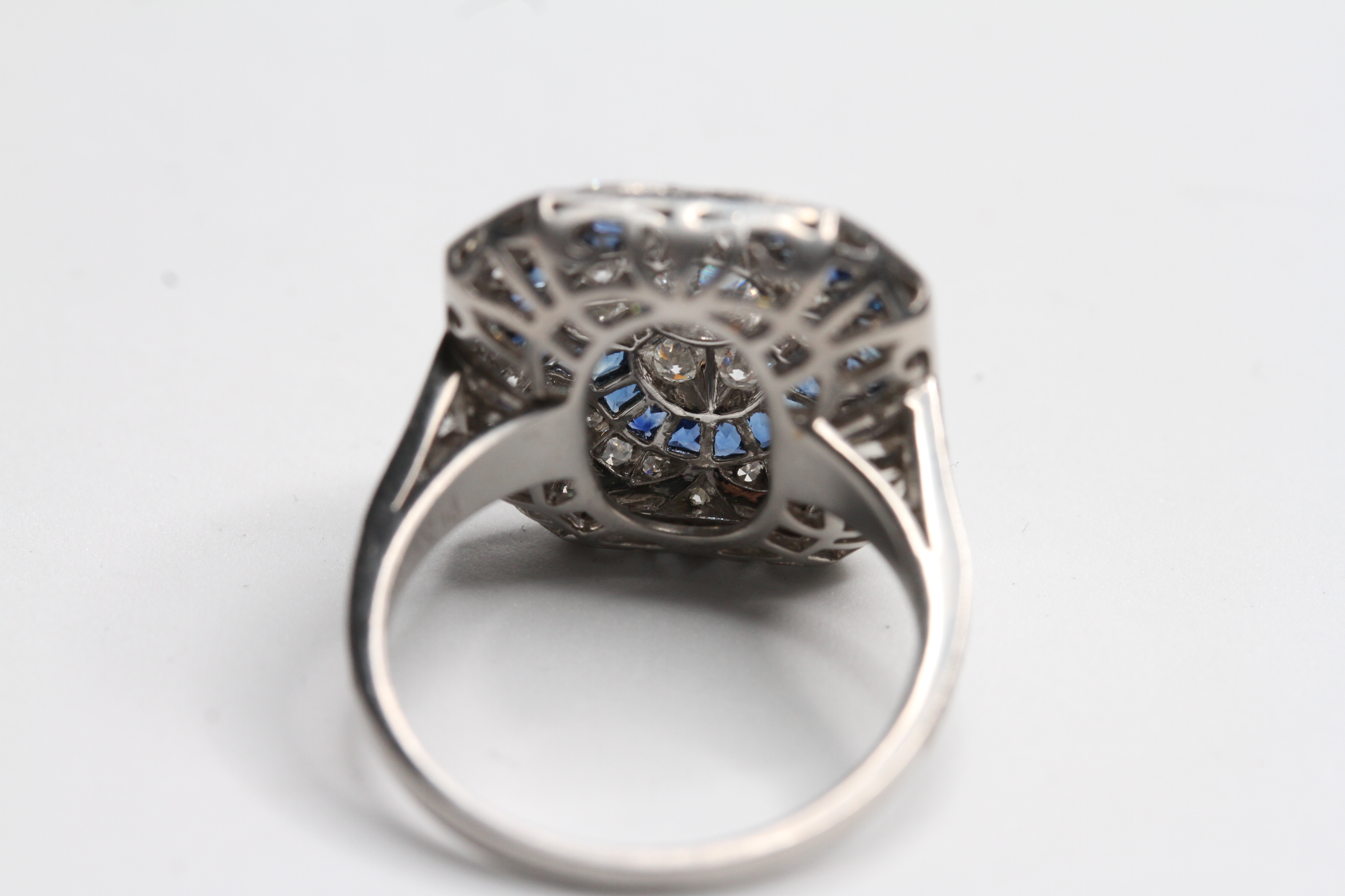 Platinum deco style ring with calibre sapphires and central diamond in 4 petal flower D 1.70ct - Image 2 of 2