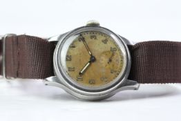 VINTAGE MILITARY LONGINES CIRCA 1940S, patina dial with Arabic numerals, minute track, stepped