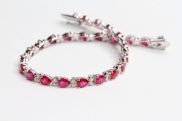 18WG ruby and diamond bracelet R9.30/0.62 Rubies are pear shape x 25 7 inches