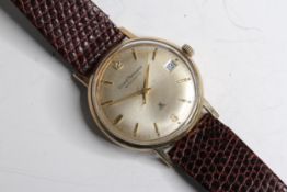 VINTAGE 9CT GIRARD PERREGAUX GYROMATIC, circular silver patina dial with baton hour markers, date