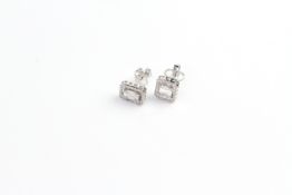 18ct illusion diamond studs with halos. Baguette and RB D0.64